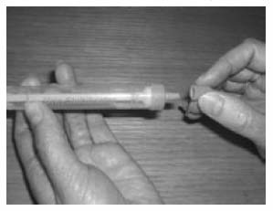 Remove the small push cap