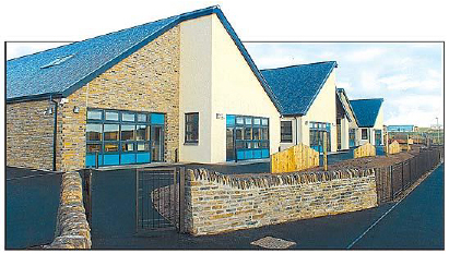 An image of the front of New Stromness Primary School, a recent waterfront development as part of the Stromness Urban Design Framework