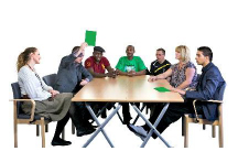 people sitting around a meeting table