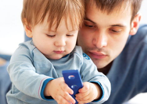 Toddler playing with parent