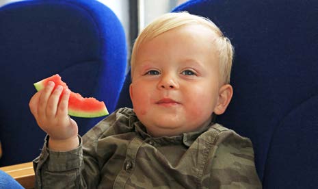 Child eating watermelon