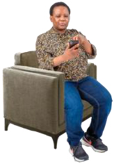 Person sitting on a chair with a TV remote
