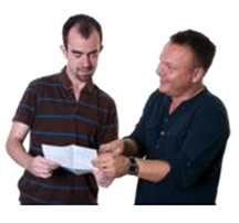 A person shows another person a piece of paper