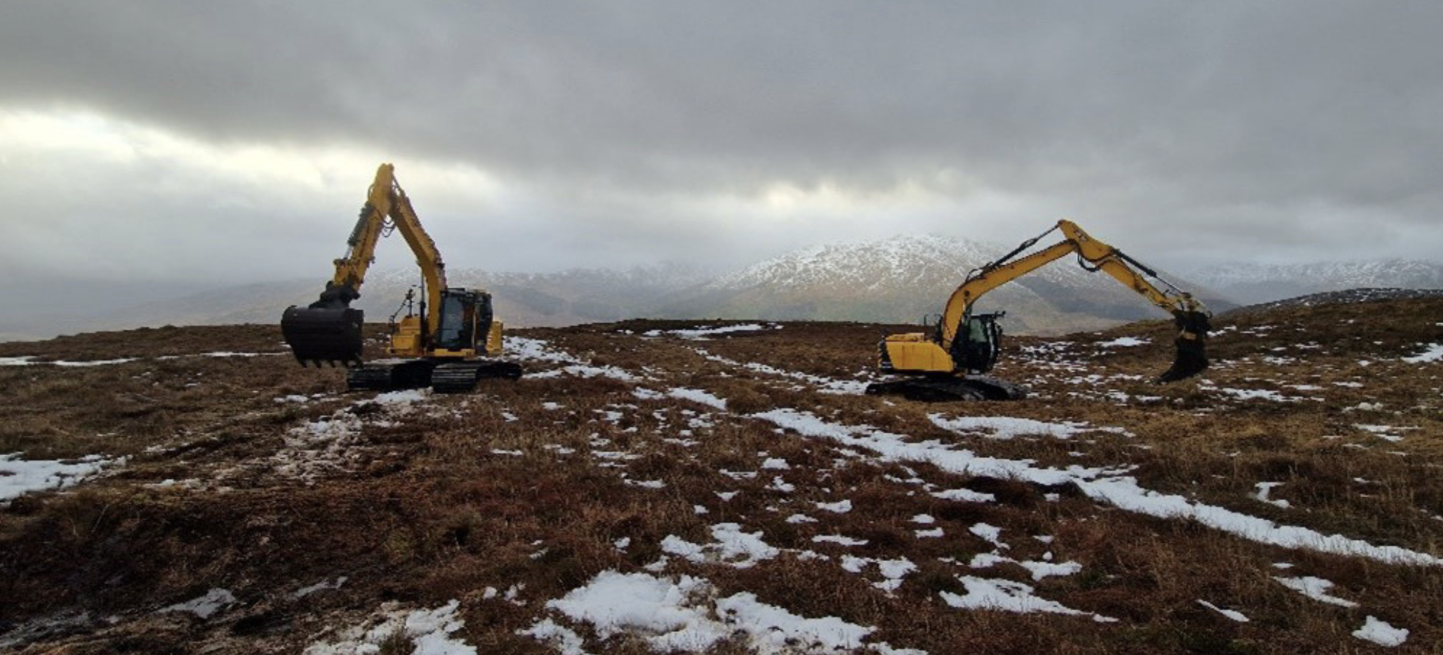 Peatland restoration diggers in the snow in Loch Lomond and Trossachs National Park.