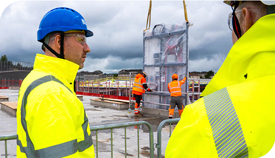 Cabinet Secretary Neil Gray looks out over the building site of the new HMP Glasgow 